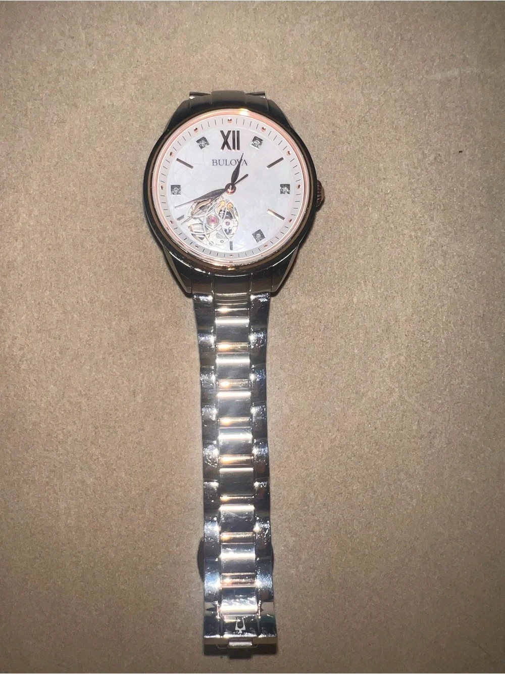 Bulova Two-Tone Silver and Rose Gold Open-Heart Bracelet Watch